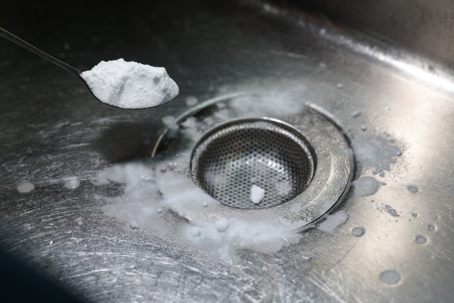 Baking soda and vinegar in a sink drain